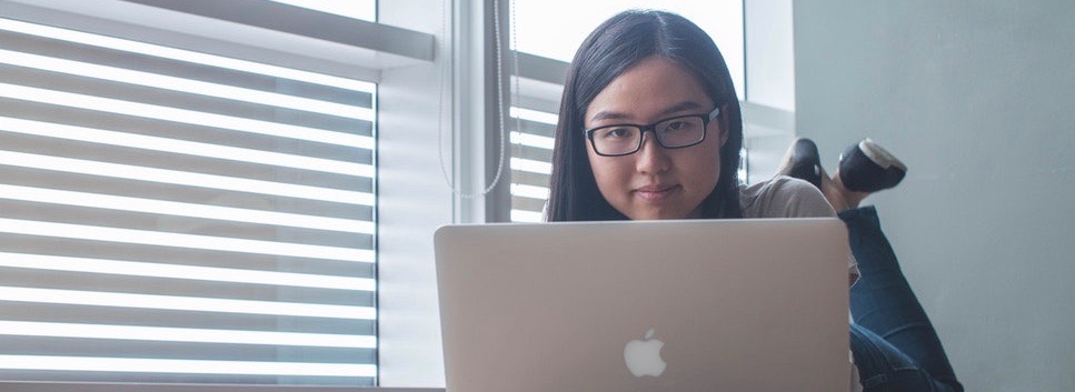 Young woman with laptop.