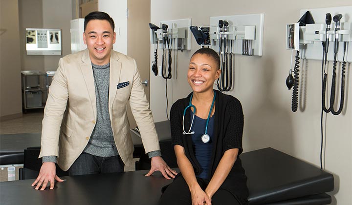 Two nursing students in an examination room.