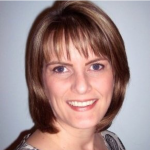 Smiling woman with short brown hair