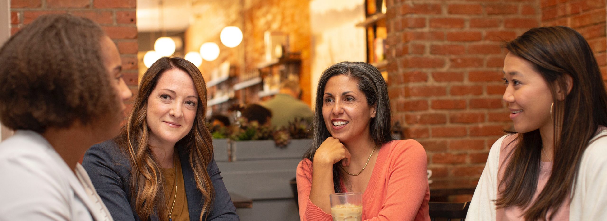 women meeting around a table